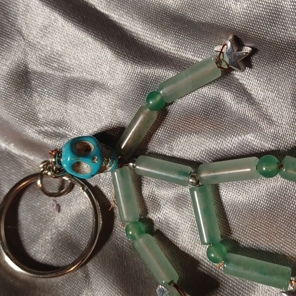 Good luck posable skeleton keychain or purse charm.